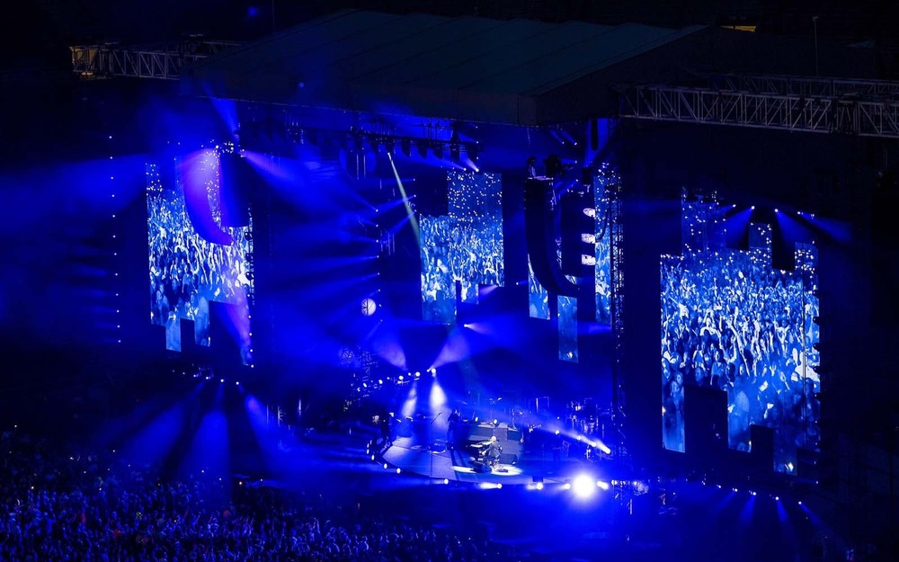 A glowing blue stage during the Billy Joel concert.