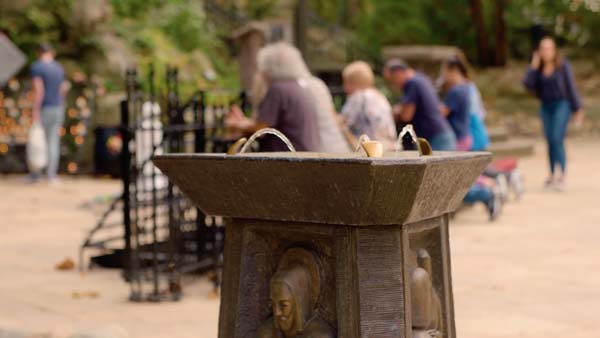 The bronze water fountain at the Grotto