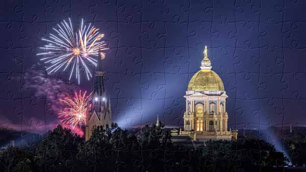 The Golden Dome and fireworks in the background.