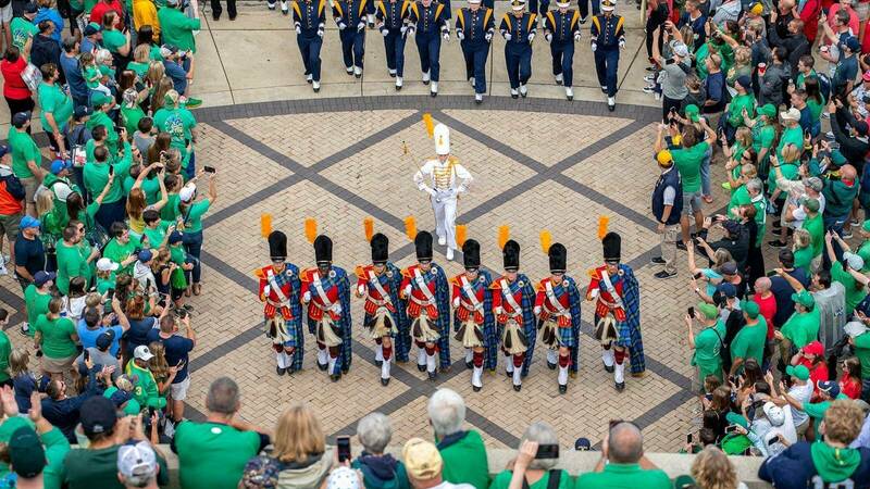 The Irish Guard leads the Notre Dame Marching Band into Notre Dame Stadium.