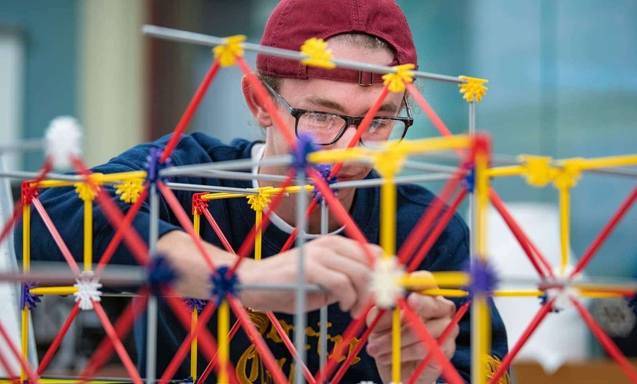 A student works on an engineering project.
