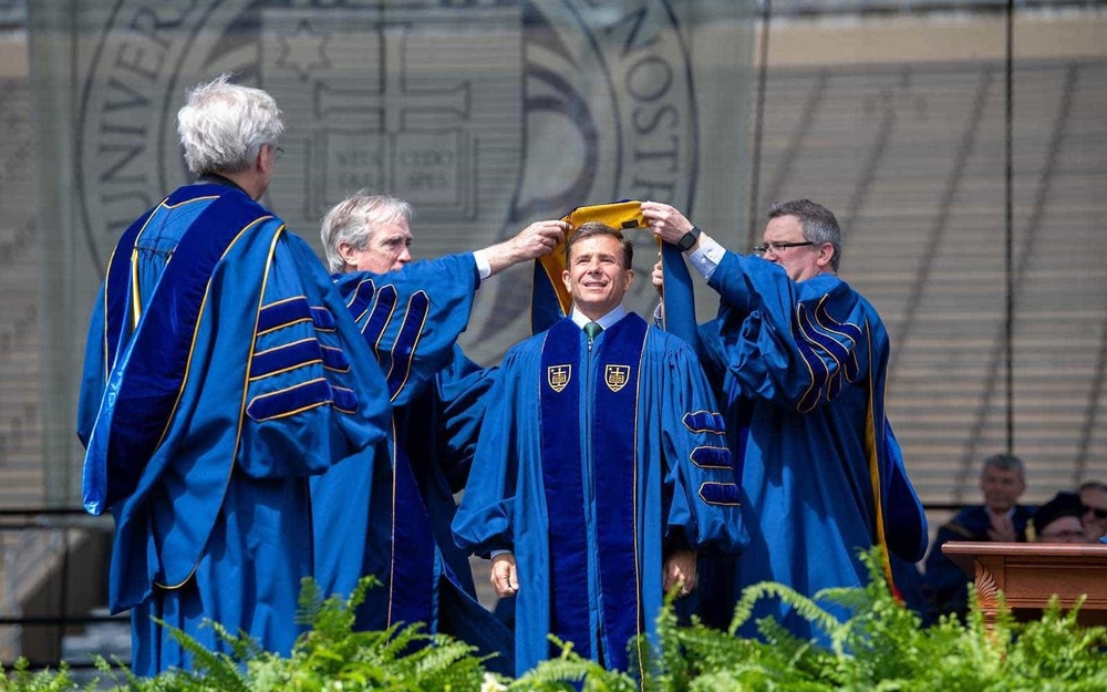 Commencement speaker John Francis Crowley receives an honorary degree at the class of 2020 Commencement ceremony in Notre Dame Stadium.