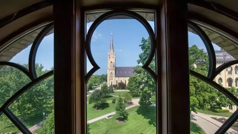 A view of the Basilica as seen from the inside wrought iron windows in Washington Hall.